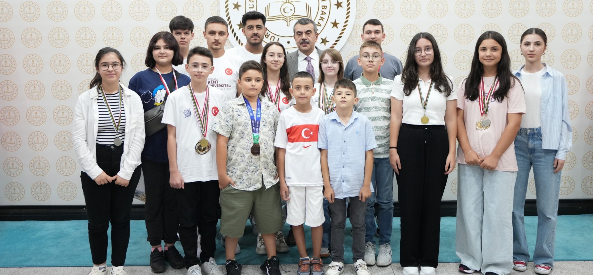 MINISTER TEKİN RECEIVES WORLD CHAMPION TURKISH NATIONAL COMPUTER KEYBOARD TEAM